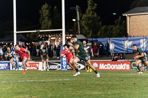 Christian Yassmin's intercept try just before halftime was a killer blow for Malta. Photo: Encore Collective
